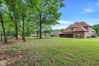 Stunning updated executive home with sunroom and screened porch on Sage Meadows Golf Course in Arkansas - for sale on GolfHomes.com, golf home, golf lot
