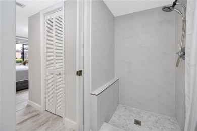 Stunning Waterview Condo in the Gated Community of East Lake on East Lake Woodlands Country Club in Florida - for sale on GolfHomes.com, golf home, golf lot