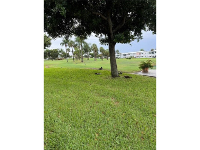 Beautifully maintained 2-bedroom, 1-bath first-floor condo with on Leisureville Community Association in Florida - for sale on GolfHomes.com, golf home, golf lot