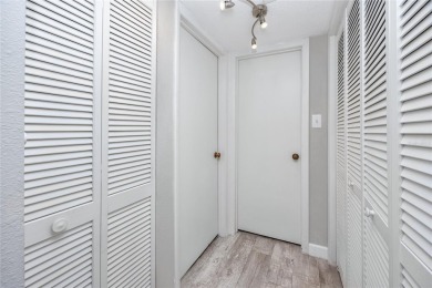 Stunning Waterview Condo in the Gated Community of East Lake on East Lake Woodlands Country Club in Florida - for sale on GolfHomes.com, golf home, golf lot