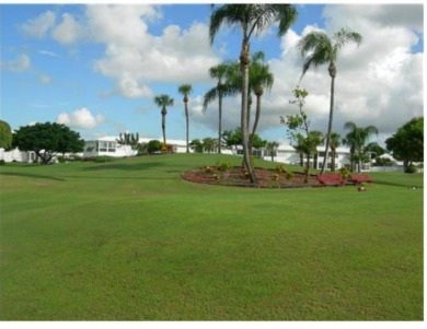 Beautifully maintained 2-bedroom, 1-bath first-floor condo with on Leisureville Community Association in Florida - for sale on GolfHomes.com, golf home, golf lot