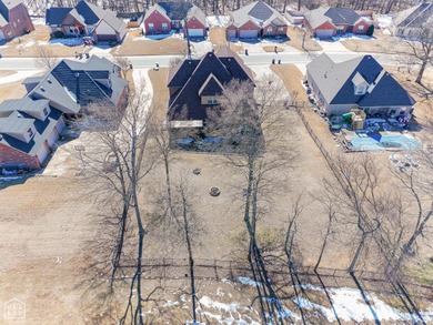 Stunning updated executive home with sunroom and screened porch on Sage Meadows Golf Course in Arkansas - for sale on GolfHomes.com, golf home, golf lot