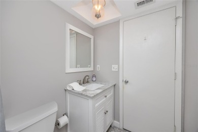 Stunning Waterview Condo in the Gated Community of East Lake on East Lake Woodlands Country Club in Florida - for sale on GolfHomes.com, golf home, golf lot