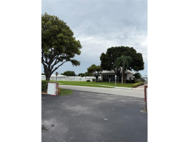 Beautifully maintained 2-bedroom, 1-bath first-floor condo with on Leisureville Community Association in Florida - for sale on GolfHomes.com, golf home, golf lot