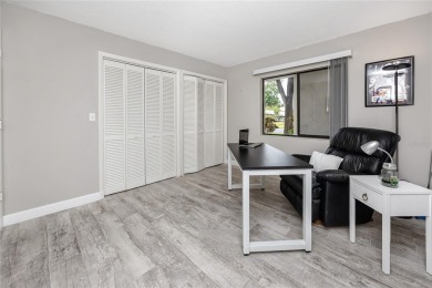 Stunning Waterview Condo in the Gated Community of East Lake on East Lake Woodlands Country Club in Florida - for sale on GolfHomes.com, golf home, golf lot