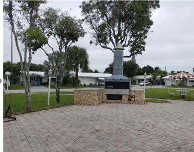 Beautifully maintained 2-bedroom, 1-bath first-floor condo with on Leisureville Community Association in Florida - for sale on GolfHomes.com, golf home, golf lot