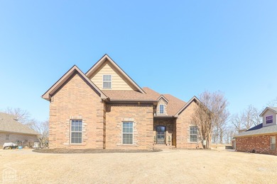 Stunning updated executive home with sunroom and screened porch on Sage Meadows Golf Course in Arkansas - for sale on GolfHomes.com, golf home, golf lot