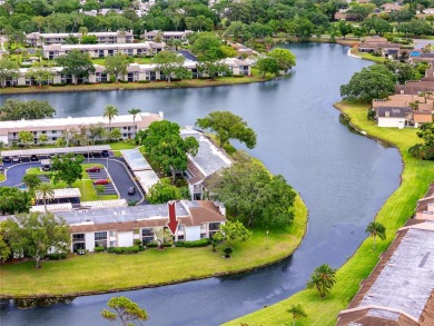 Stunning Waterview Condo in the Gated Community of East Lake on East Lake Woodlands Country Club in Florida - for sale on GolfHomes.com, golf home, golf lot