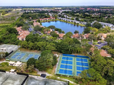 Stunning Waterview Condo in the Gated Community of East Lake on East Lake Woodlands Country Club in Florida - for sale on GolfHomes.com, golf home, golf lot
