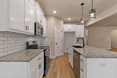 Experience modern living surrounded by nature! This brand-new on Bella Vista Country Club - Scottsdale in Arkansas - for sale on GolfHomes.com, golf home, golf lot