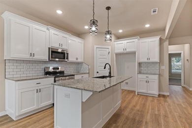 Experience modern living surrounded by nature! This brand-new on Bella Vista Country Club - Scottsdale in Arkansas - for sale on GolfHomes.com, golf home, golf lot