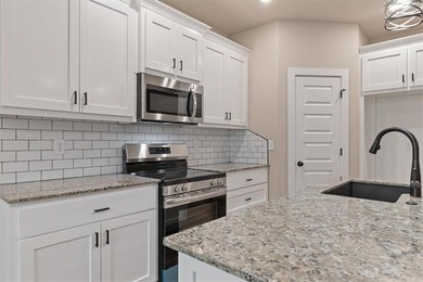 Experience modern living surrounded by nature! This brand-new on Bella Vista Country Club - Scottsdale in Arkansas - for sale on GolfHomes.com, golf home, golf lot