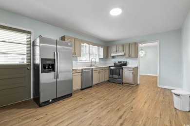 Welcome to 917 9th Avenue S, a spacious 4-bedroom, 3-bathroom on Possum Trot Golf Course in South Carolina - for sale on GolfHomes.com, golf home, golf lot