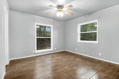 Nestled in a quiet cul-de-sac, this gem boasts 3 br 2ba with the on Rayburn Country Club in Texas - for sale on GolfHomes.com, golf home, golf lot