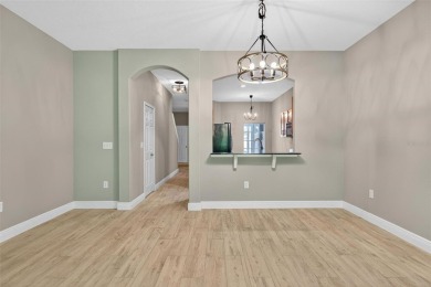 Experience refined comfort and unbeatable value in this on Heritage Isles Golf and Country Club in Florida - for sale on GolfHomes.com, golf home, golf lot