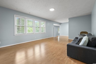 Welcome to 917 9th Avenue S, a spacious 4-bedroom, 3-bathroom on Possum Trot Golf Course in South Carolina - for sale on GolfHomes.com, golf home, golf lot