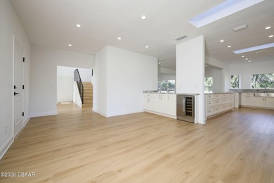 Set on an expansive golf course lot with mature, lush on Spruce Creek Golf Club in Florida - for sale on GolfHomes.com, golf home, golf lot