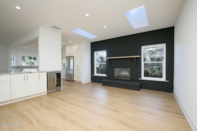 Set on an expansive golf course lot with mature, lush on Spruce Creek Golf Club in Florida - for sale on GolfHomes.com, golf home, golf lot