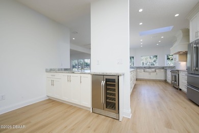 Set on an expansive golf course lot with mature, lush on Spruce Creek Golf Club in Florida - for sale on GolfHomes.com, golf home, golf lot