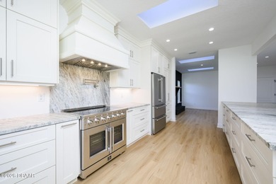 Set on an expansive golf course lot with mature, lush on Spruce Creek Golf Club in Florida - for sale on GolfHomes.com, golf home, golf lot