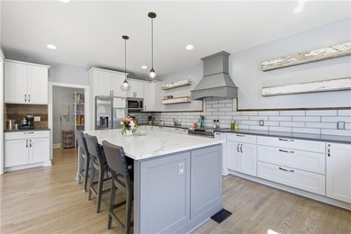 Welcome home to this beautiful 5-bedroom, 4.5-bath residence in on Falcon Valley Golf Course in Kansas - for sale on GolfHomes.com, golf home, golf lot