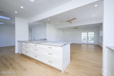 Set on an expansive golf course lot with mature, lush on Spruce Creek Golf Club in Florida - for sale on GolfHomes.com, golf home, golf lot