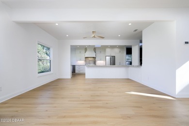 Set on an expansive golf course lot with mature, lush on Spruce Creek Golf Club in Florida - for sale on GolfHomes.com, golf home, golf lot