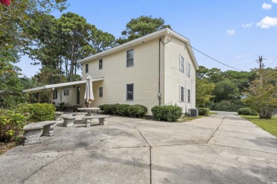 Welcome to 917 9th Avenue S, a spacious 4-bedroom, 3-bathroom on Possum Trot Golf Course in South Carolina - for sale on GolfHomes.com, golf home, golf lot