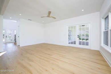 Set on an expansive golf course lot with mature, lush on Spruce Creek Golf Club in Florida - for sale on GolfHomes.com, golf home, golf lot