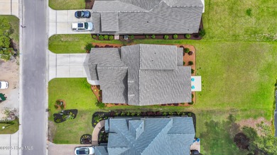 Welcome to 7317 Leith Lane, Sunset Beach, NC Discover laid-back on Thistle Golf Club in North Carolina - for sale on GolfHomes.com, golf home, golf lot