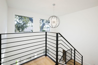 Set on an expansive golf course lot with mature, lush on Spruce Creek Golf Club in Florida - for sale on GolfHomes.com, golf home, golf lot