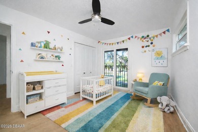 Set on an expansive golf course lot with mature, lush on Spruce Creek Golf Club in Florida - for sale on GolfHomes.com, golf home, golf lot