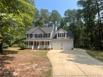 Seize the opportunity to own this stunning 2-story home located on Carolina Lakes Country Club in North Carolina - for sale on GolfHomes.com, golf home, golf lot