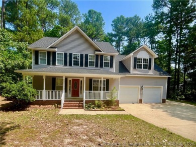 Seize the opportunity to own this stunning 2-story home located on Carolina Lakes Country Club in North Carolina - for sale on GolfHomes.com, golf home, golf lot