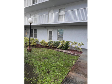 This beautifully remodeled 2-bedroom, 2-bath unit features a on Oriole Golf and Tennis Club in Florida - for sale on GolfHomes.com, golf home, golf lot