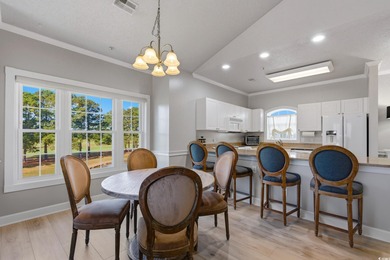 You have to see the golf & water views from this end unit top on  in South Carolina - for sale on GolfHomes.com, golf home, golf lot