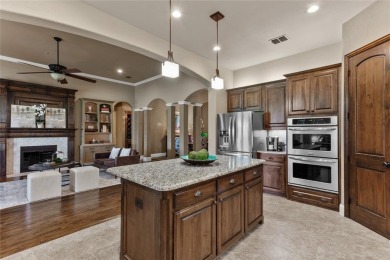 This exquisite, customized Drees one-story brick and stone on Lantana Golf Club in Texas - for sale on GolfHomes.com, golf home, golf lot