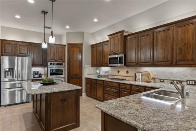 This exquisite, customized Drees one-story brick and stone on Lantana Golf Club in Texas - for sale on GolfHomes.com, golf home, golf lot