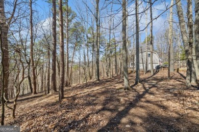 Perched among some of the highest elevations in Lake Arrowhead on The Highlands Course at Lake Arrowhead in Georgia - for sale on GolfHomes.com, golf home, golf lot