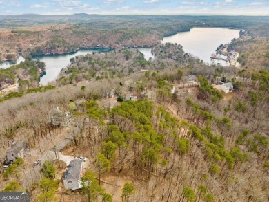 Perched among some of the highest elevations in Lake Arrowhead on The Highlands Course at Lake Arrowhead in Georgia - for sale on GolfHomes.com, golf home, golf lot
