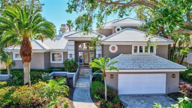 This stunning 4-bedroom home, located on the tranquil Bay Isles on Longboat Key Golf Club in Florida - for sale on GolfHomes.com, golf home, golf lot