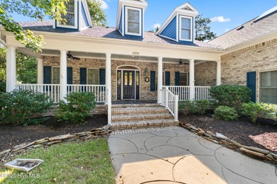 Come see this 3700 sq ft custom brick beauty. Ideally set up on Members Club At St. James Plantation in North Carolina - for sale on GolfHomes.com, golf home, golf lot