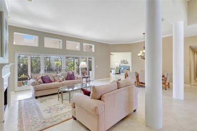 This stunning 4-bedroom home, located on the tranquil Bay Isles on Longboat Key Golf Club in Florida - for sale on GolfHomes.com, golf home, golf lot