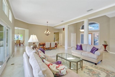 This stunning 4-bedroom home, located on the tranquil Bay Isles on Longboat Key Golf Club in Florida - for sale on GolfHomes.com, golf home, golf lot