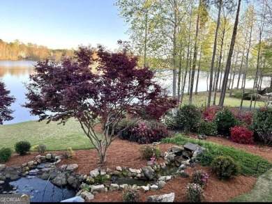 DISCOVER EXCEPTIONAL LAKEFRONT LIVING in the highly sought-after on Summergrove Golf Club in Georgia - for sale on GolfHomes.com, golf home, golf lot