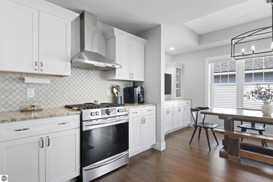 Welcome to 2764 W Crown Drive--a stunning 2022 ranch-style home on Crown Golf Course in Michigan - for sale on GolfHomes.com, golf home, golf lot