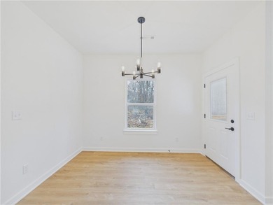 This inviting new construction Bella Vista home sits in a prime on Branchwood Golf Course in Arkansas - for sale on GolfHomes.com, golf home, golf lot