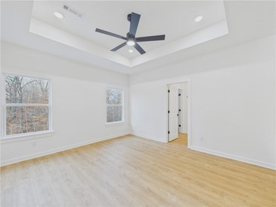 This inviting new construction Bella Vista home sits in a prime on Branchwood Golf Course in Arkansas - for sale on GolfHomes.com, golf home, golf lot