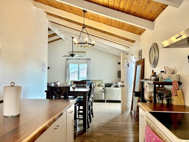 This large parcel with updated, single level 3 bed/2 bath home on Waikoloa Village Golf Club in Hawaii - for sale on GolfHomes.com, golf home, golf lot