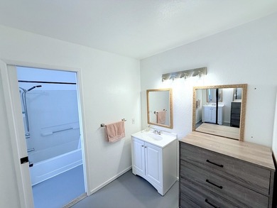 This large parcel with updated, single level 3 bed/2 bath home on Waikoloa Village Golf Club in Hawaii - for sale on GolfHomes.com, golf home, golf lot